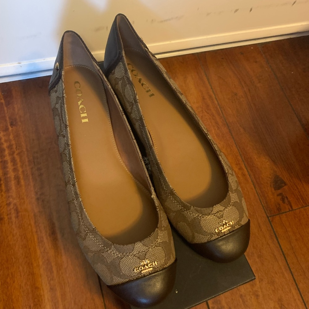 Coach flats.